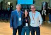 Hans Münch: 45 Jahre Fitnessmarkt, 12 Lektionen für Dein Fitnessstudio Hans Münch, Iris Leibrecht und Michael Leibrecht vor der Sponsorenwand des HFA-Europakongresses